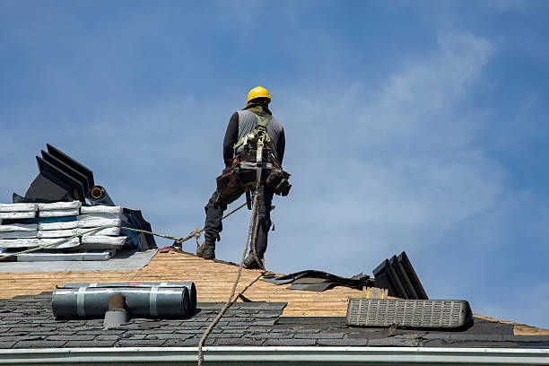 Professional Gutter Installation technician working in Belmont, MA